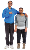 man with arm around the shoulder of another man