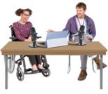 2 people sitting at a table speaking into microphones