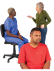 man being ignored while 2 professionals talk to one another