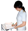 nurse looking through papers