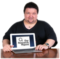 Man holding an iPad with text 'Our research report'